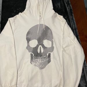White hoodie with black skull